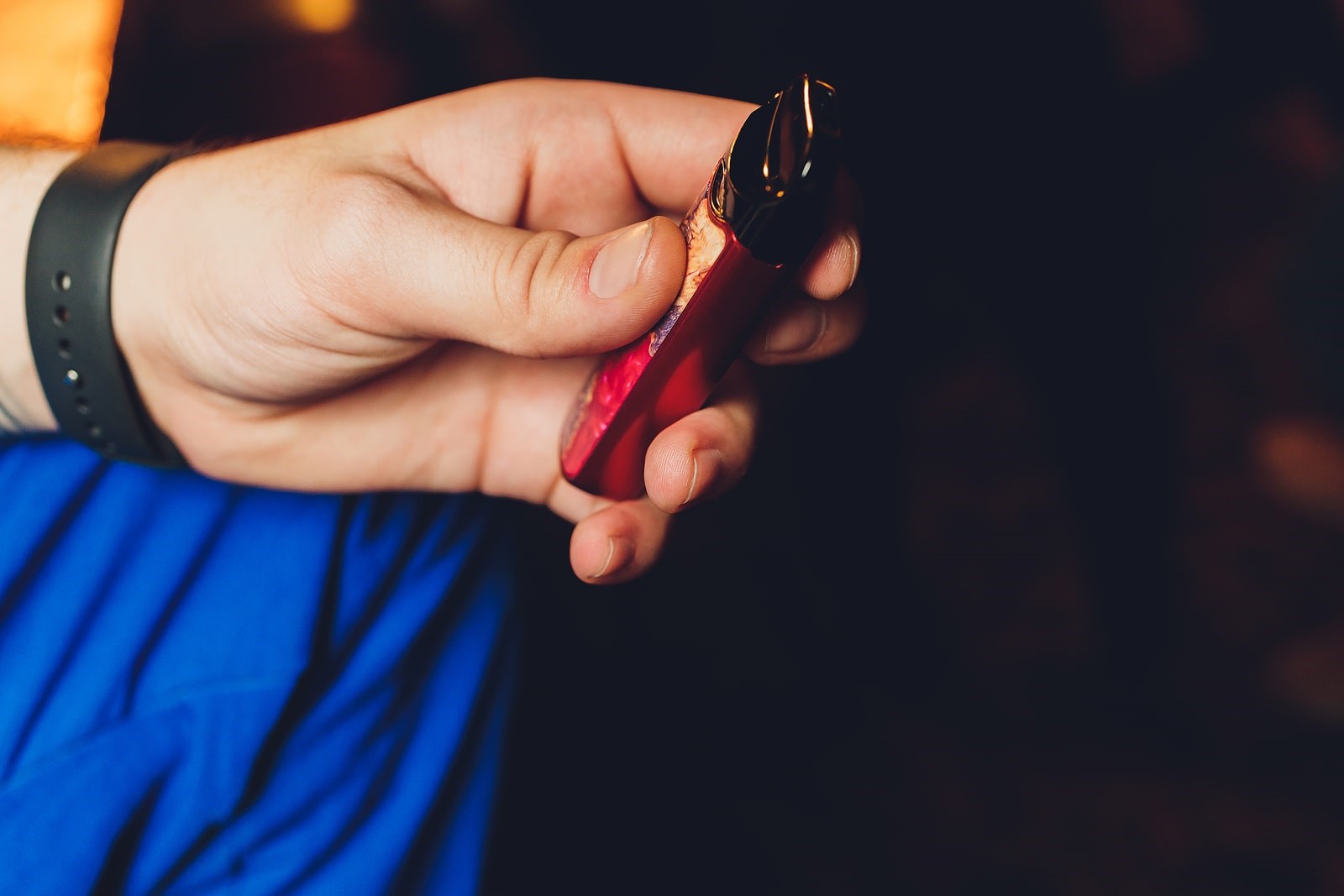 Pod vape device in hand